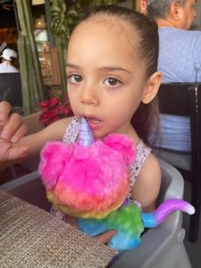 Amaia and her fury toy